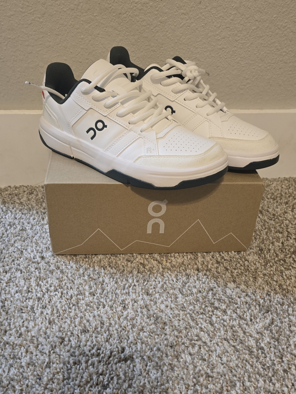 On Running Men's White Sneakers with Black Accents